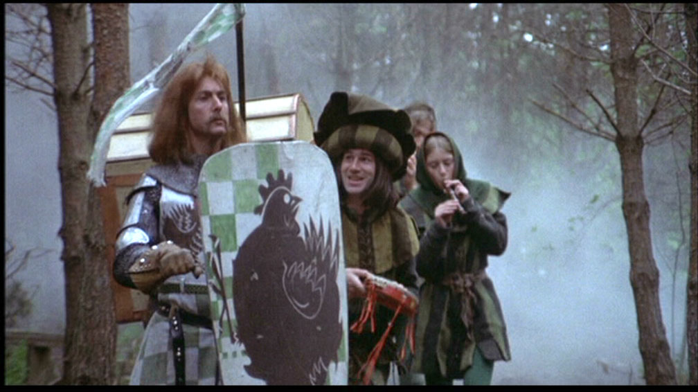 Brave Sir Robin (Eric Idle at front, Neil Innes behind him). Monty Python and the Holy Grail.