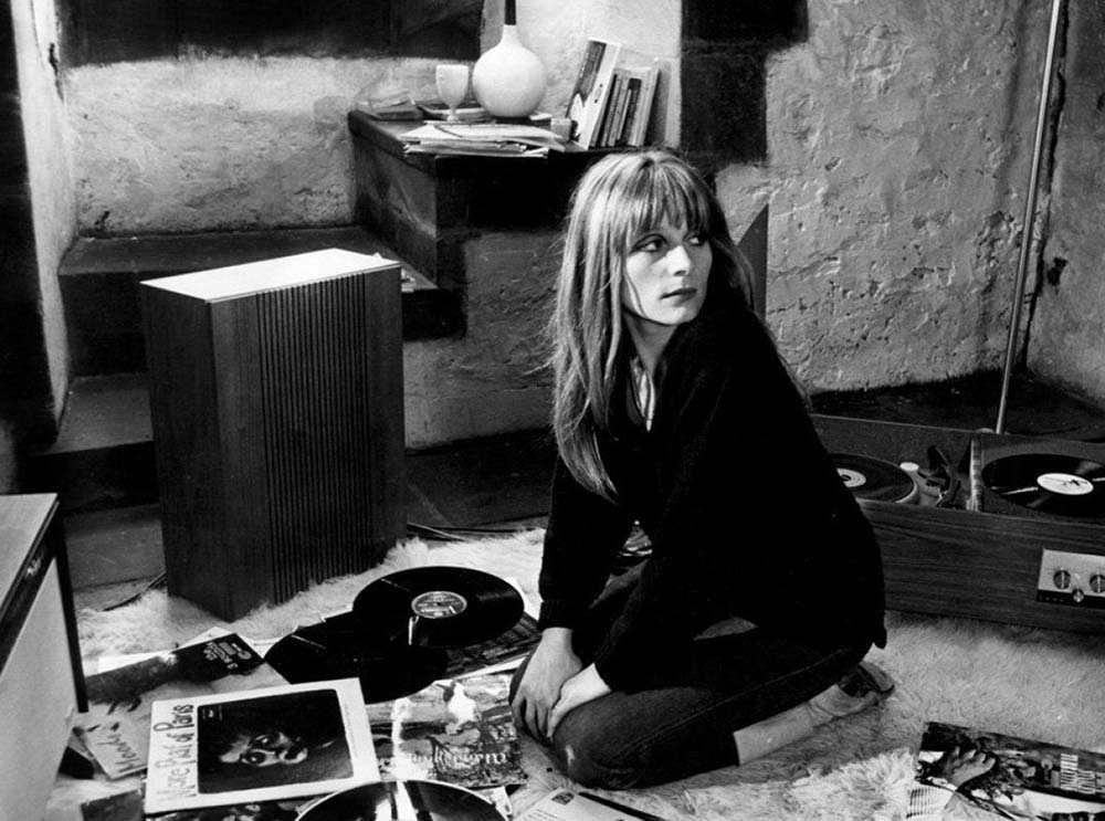 Françoise Dorléac as Teresa in Cul-de-sac (1966), surrounded by records